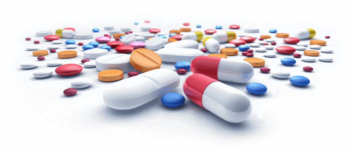 Medikamente, Pillen und Tabletten in verschiedenen Farben, alle gemischt